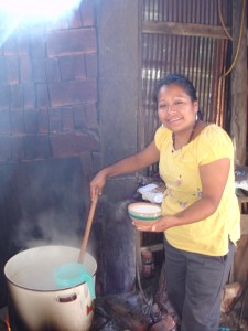 Anita serving up atole